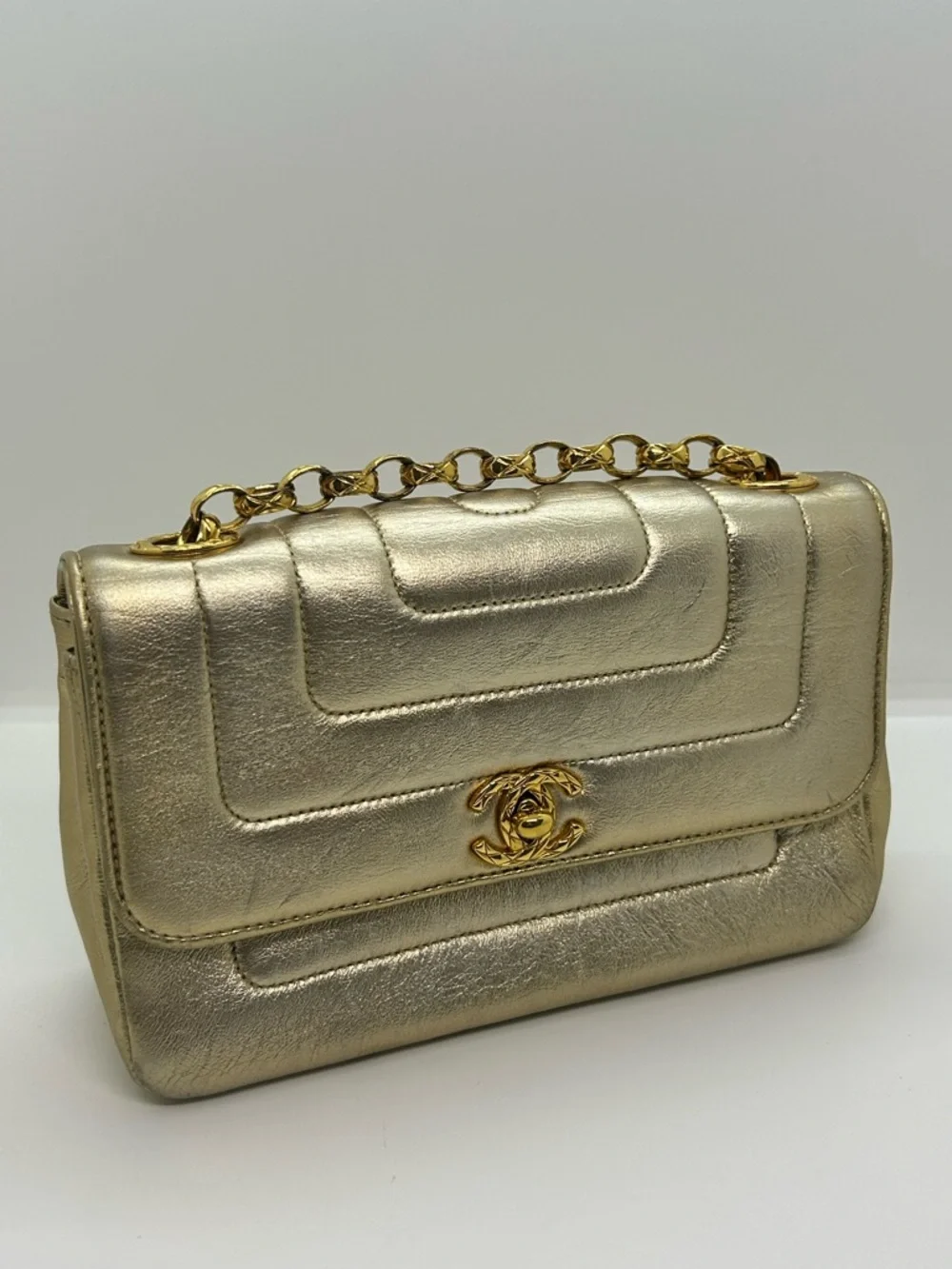 CHANEL Vintage Metallic Gold Vertical Quilt Bijou Chain Mini Border Flap Bag
